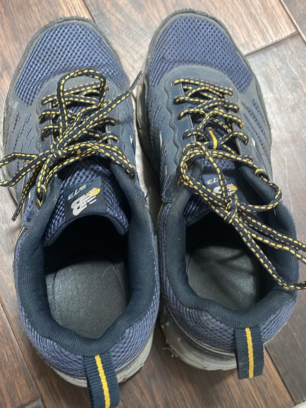 New Balance Men's Navy Sneakers with Yellow Detailing